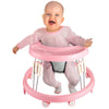 Baby in a pink walker on a white background